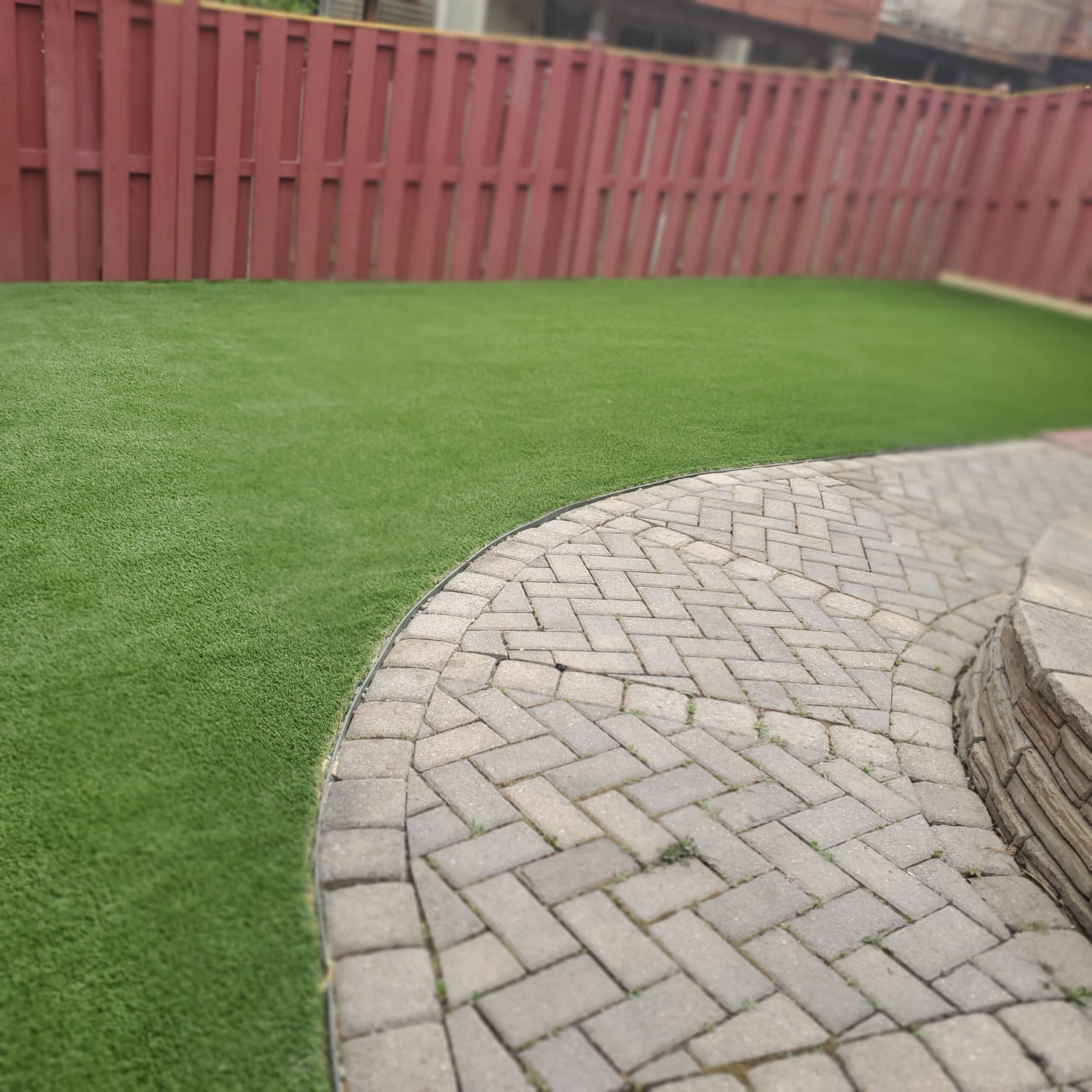 Artificial Turf Around Curved Patio in Reston, VA